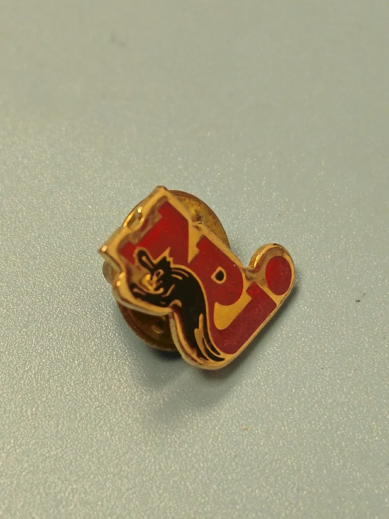 Vintage pin's NRJ radio logo rouge doré collection années 90