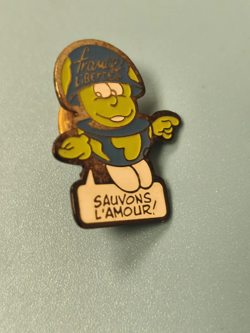 Pin's vintage France Libertés "Sauvons l'amour" personnage coloré ancien