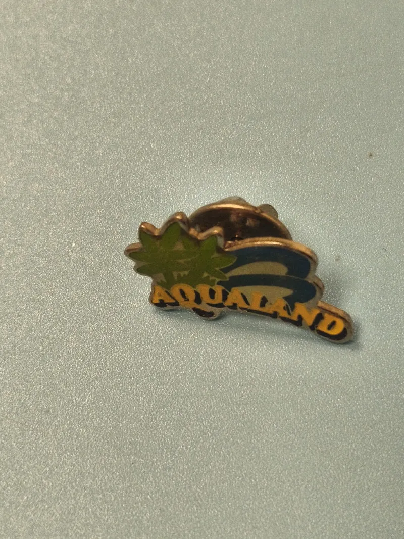 Pin's vintage Aqualand ancien, émaillé, logo palme verte, collection