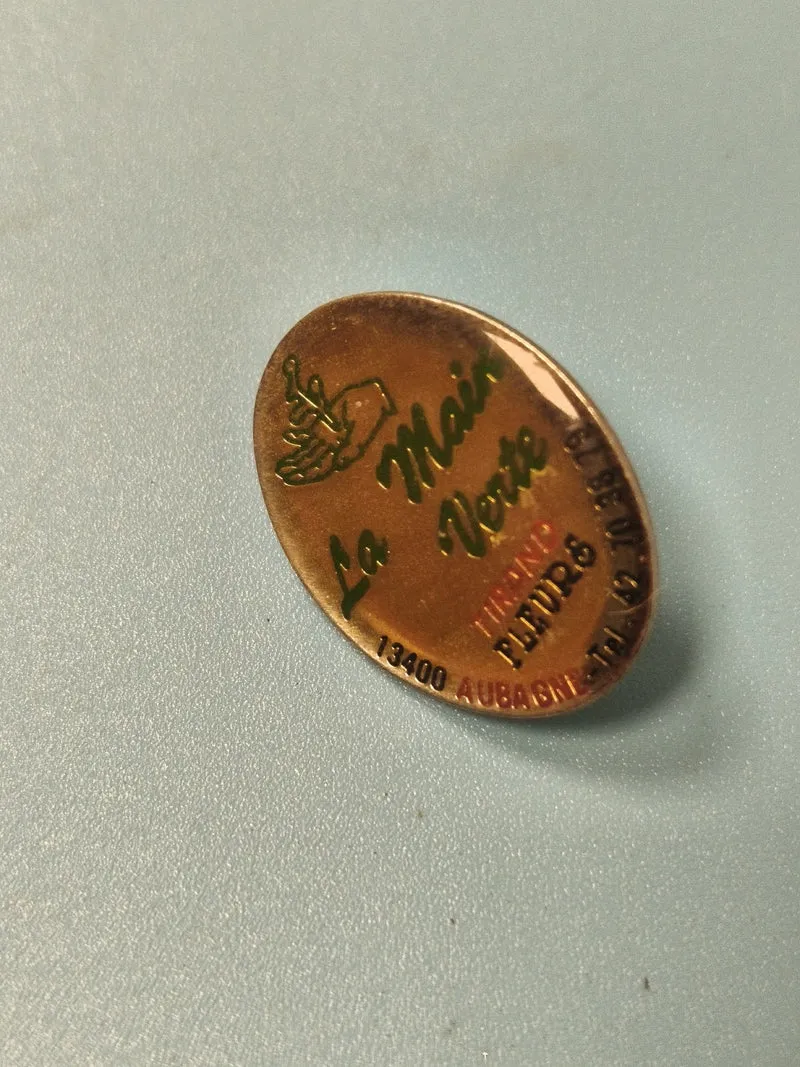 Vintage pin's ovale La Main Verte vert doré, fleuriste Aubagne collection (Ref 7