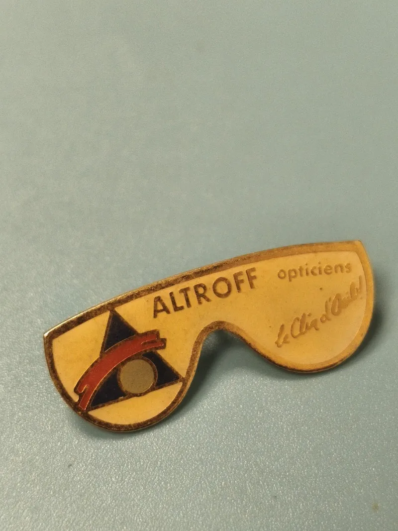 Vintage pin's Altroff opticiens forme lunettes jaune publicitaire rétro (Ref 7)