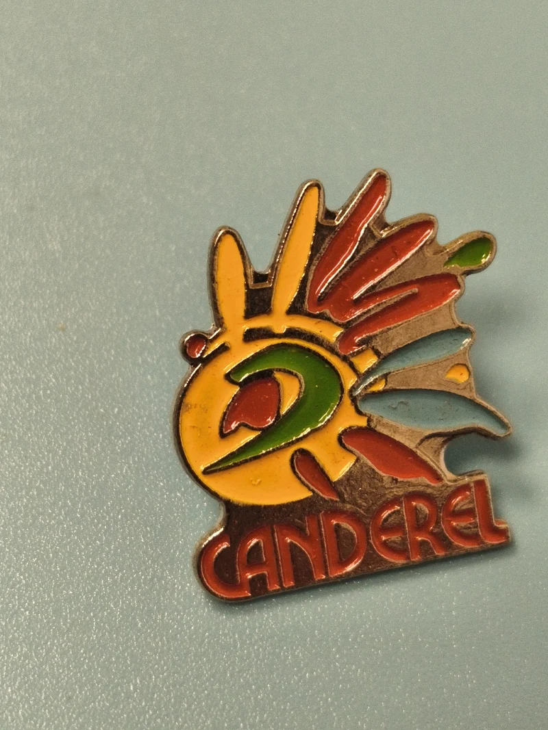 Vintage pin's Canderel multicolore collection publicité ancien badge