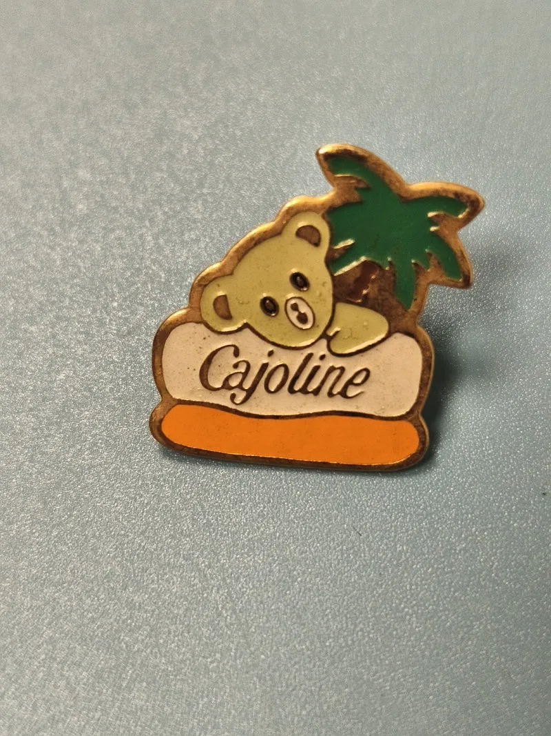 Vintage pin's Cajoline ourson palmier émaillé collection publicitaire rare
