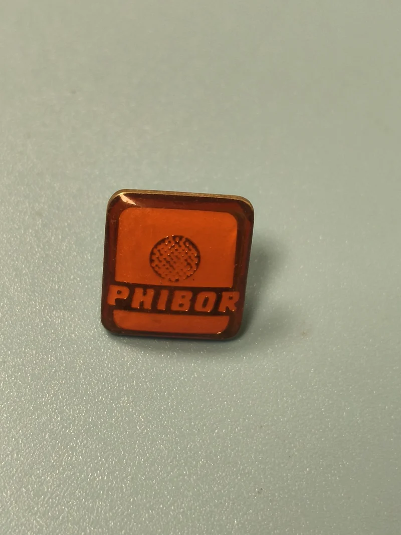 Vintage pin's PHIBOR rectangulaire orange logo relief collection (Ref 13)