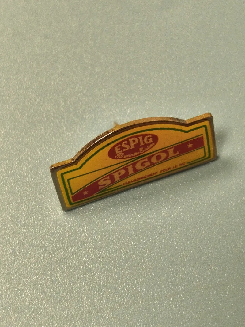 Pin's vintage Spigol ancien publicité épices jaune rouge collection rétro