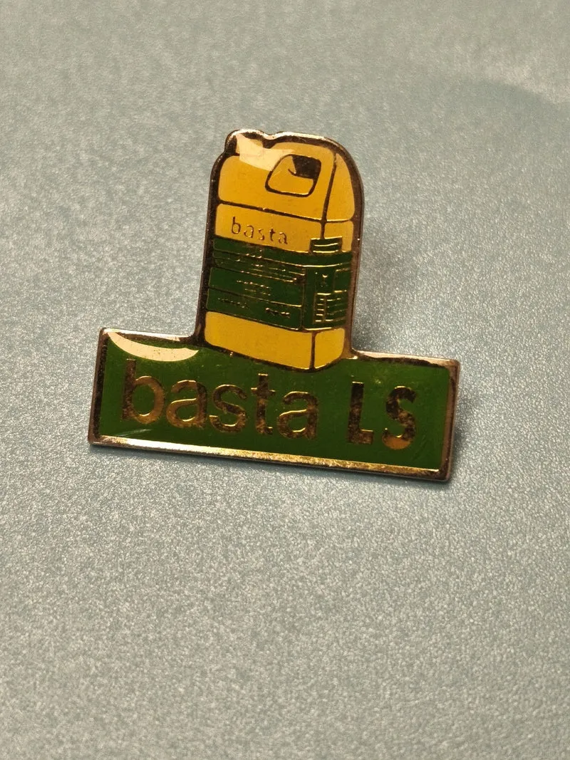 Vintage pin's basta LS vert jaune publicitaire ancien collection (Ref 13)