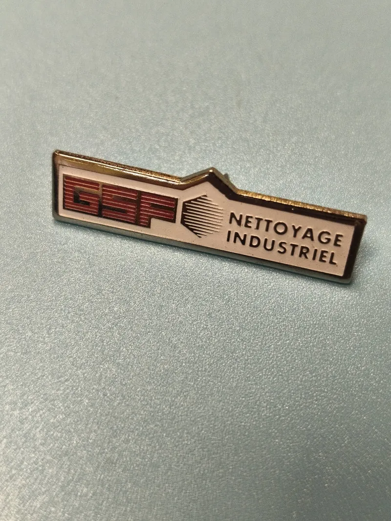 Vintage pin's GSF Nettoyage Industriel badge ancien collection publicitaire