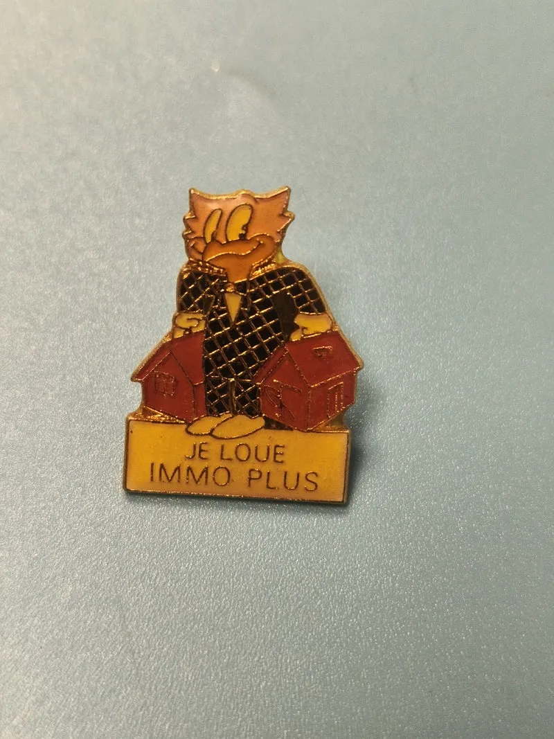 Vintage pin's publicitaire Immo Plus chat mascotte immobilier ancien