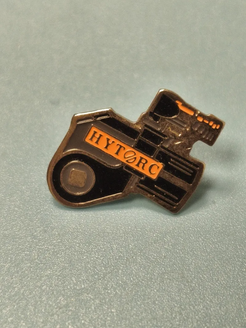 Vintage pin's HYTORC outil industriel noir et orange collection (Ref 19)
