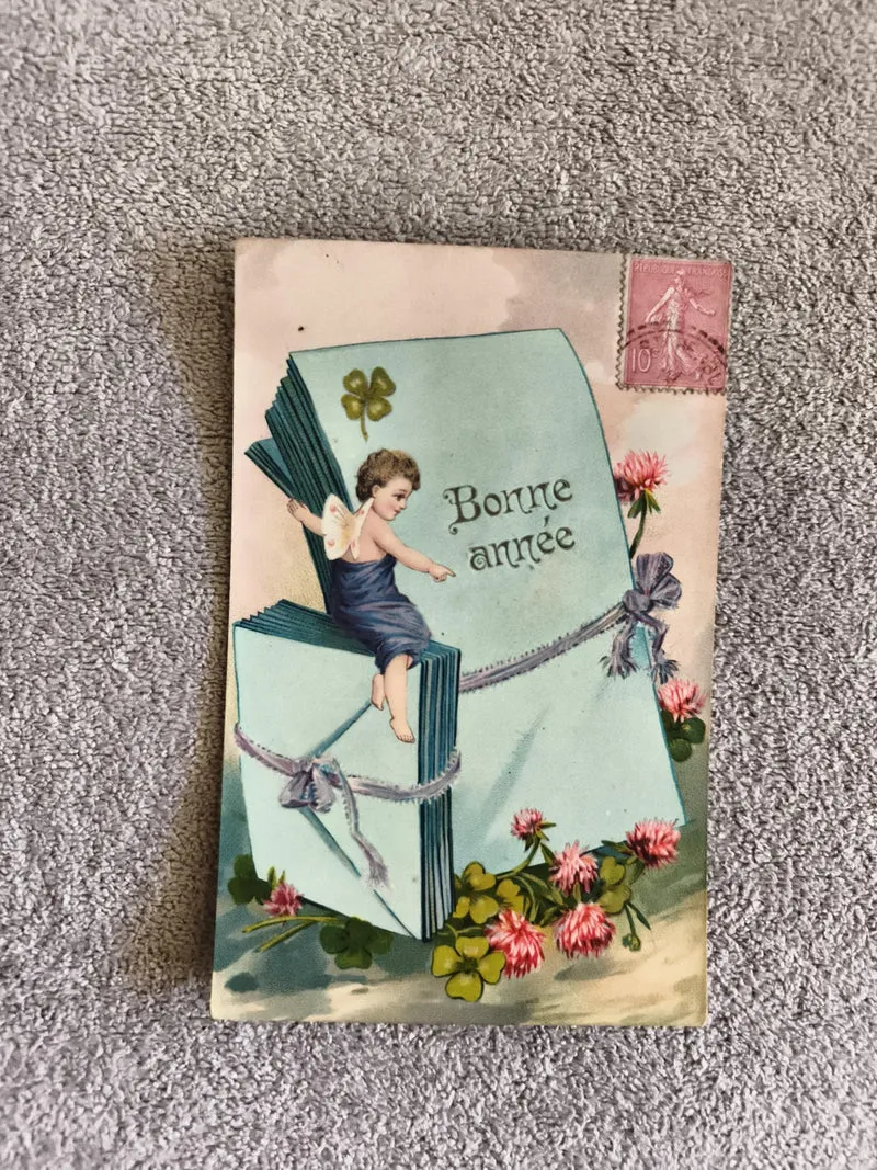 Carte postale illustrée Bonne année CPA ange trèfle fleurs timbre 10c France