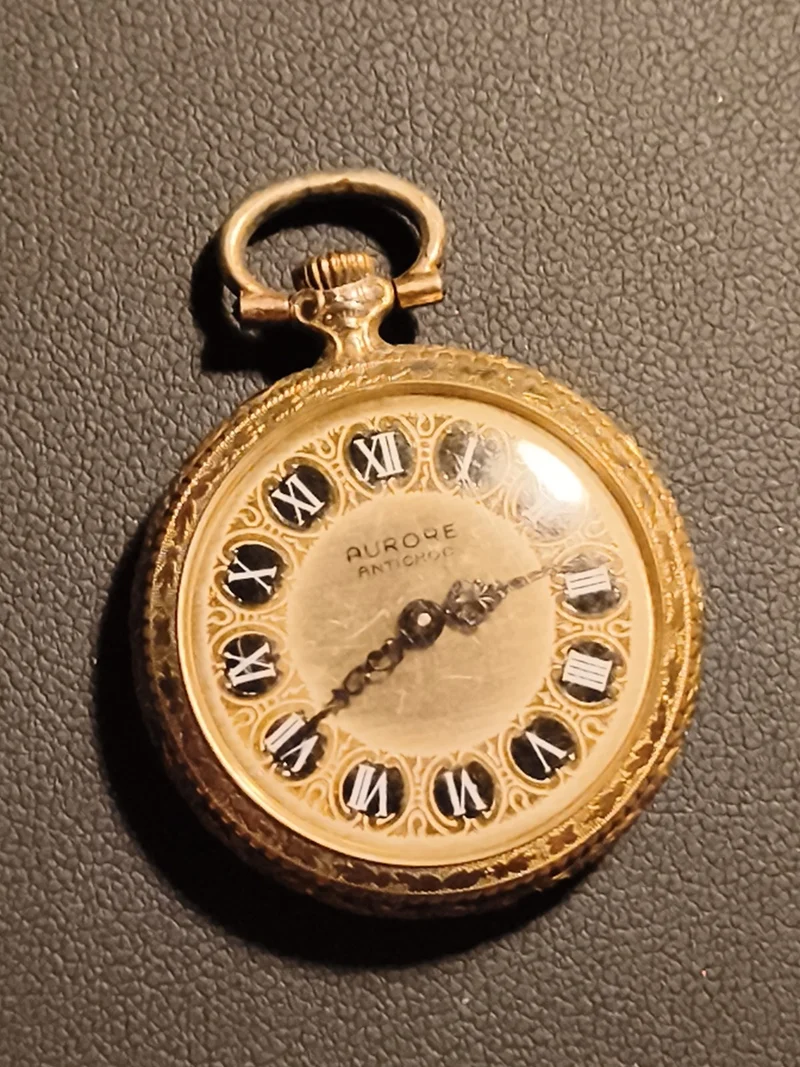 Montre de poche ancienne Aurore Antichoc dorée chiffres romains vintage