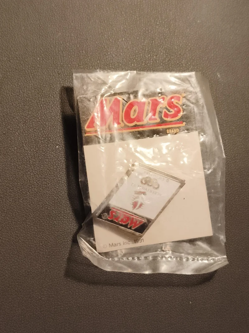 Pin's Mars Albertville 1992 Jeux Olympiques logo carré emballage scellé