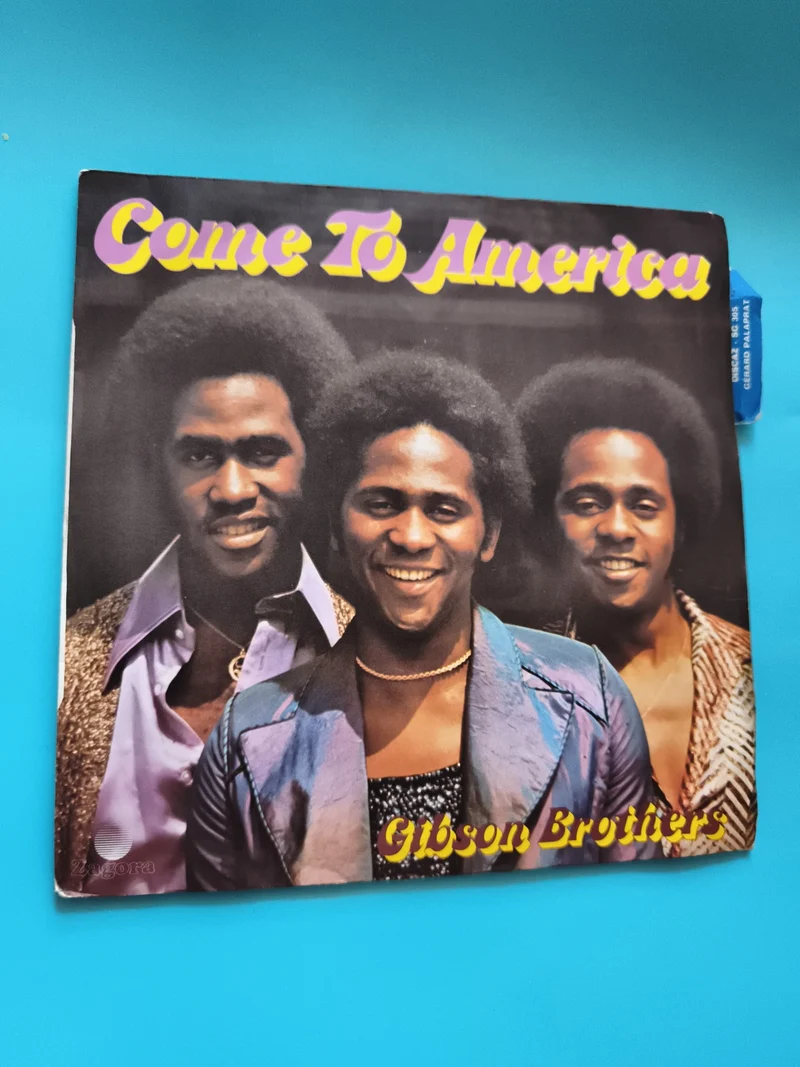 Vinyle 45 tours Gibson Brothers Come To America pochette couleur disco