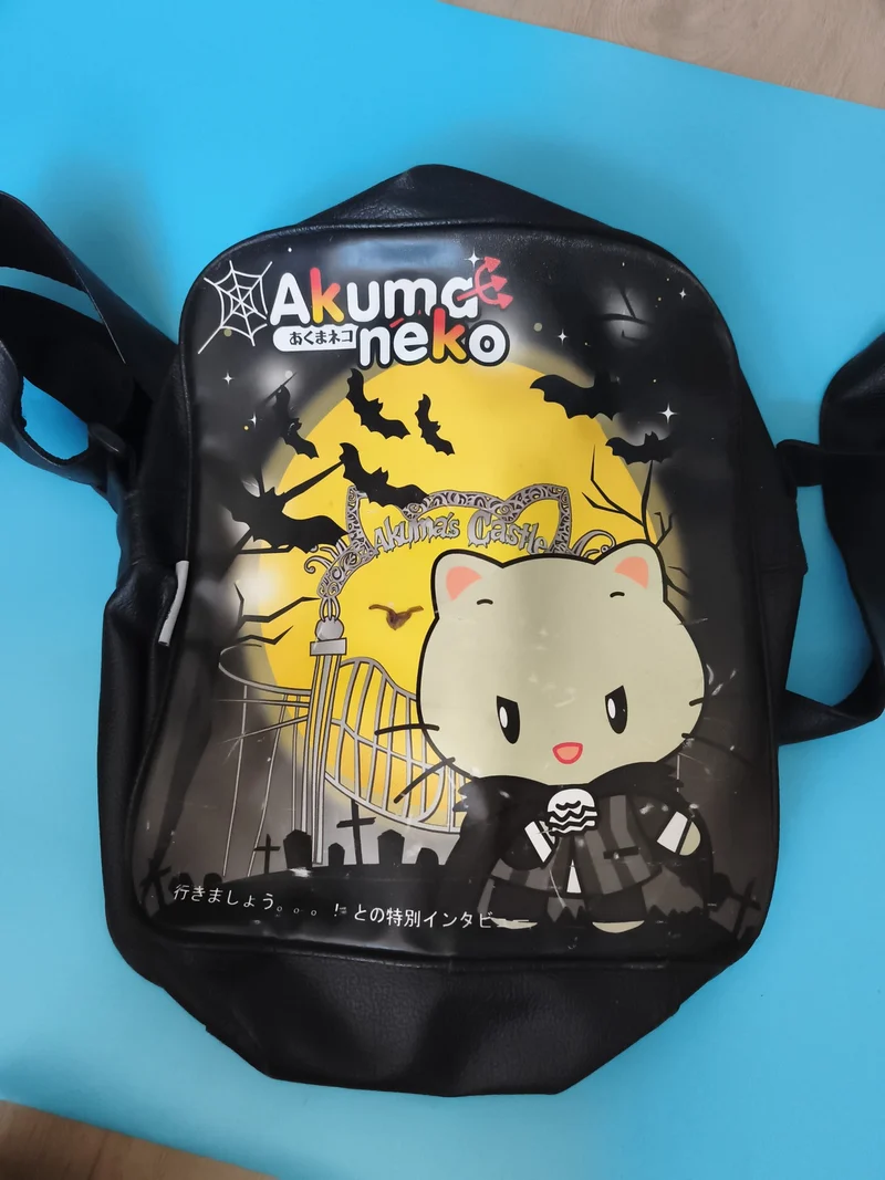 Sac à dos Akuma Neko motif chat gothique noir jaune manga japonais