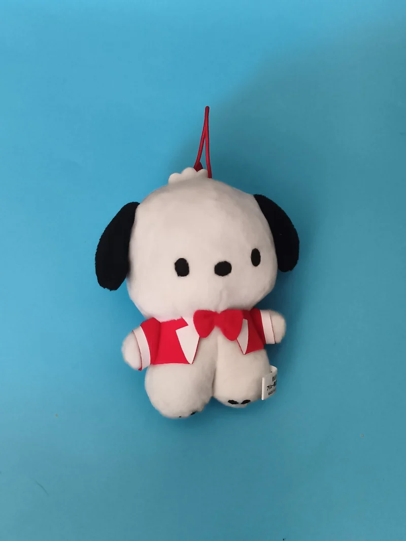 Peluche chien blanc noir noeud papillon rouge mascotte kawaii suspendue Collecto