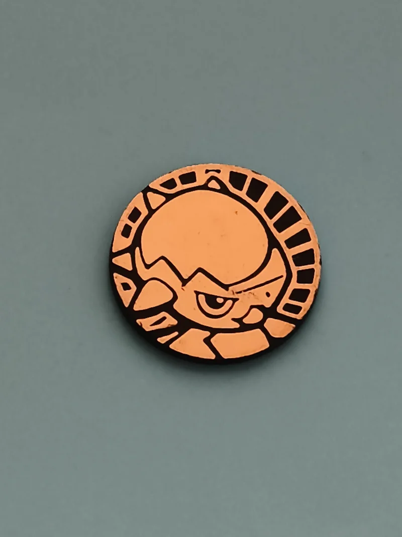 Jeton Pokémon orange Crustabri jeu toupie accessoire token