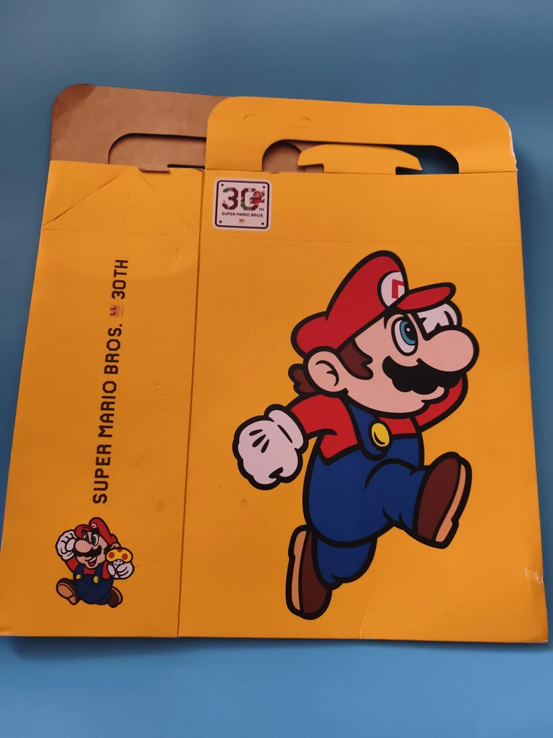 Pochette Super Mario Bros 30th anniversaire Nintendo carton jaune