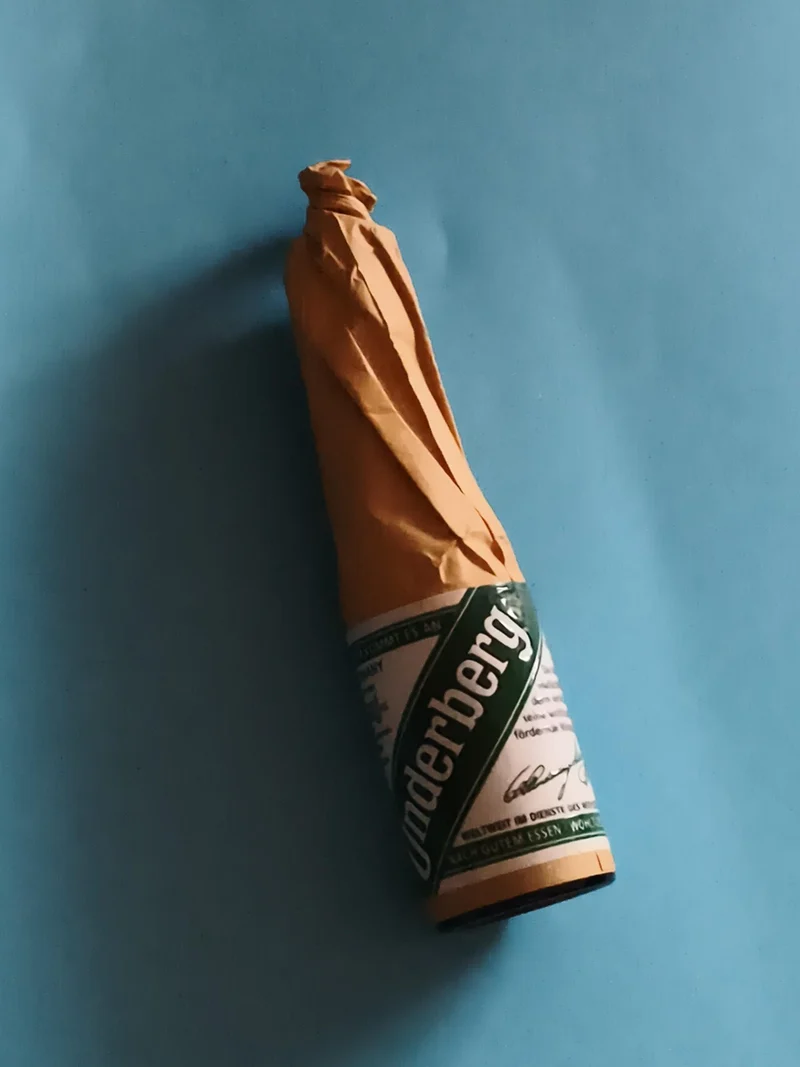 Mignonnette vintage Underberg apéritif alcool, flacon emballé papier ancien