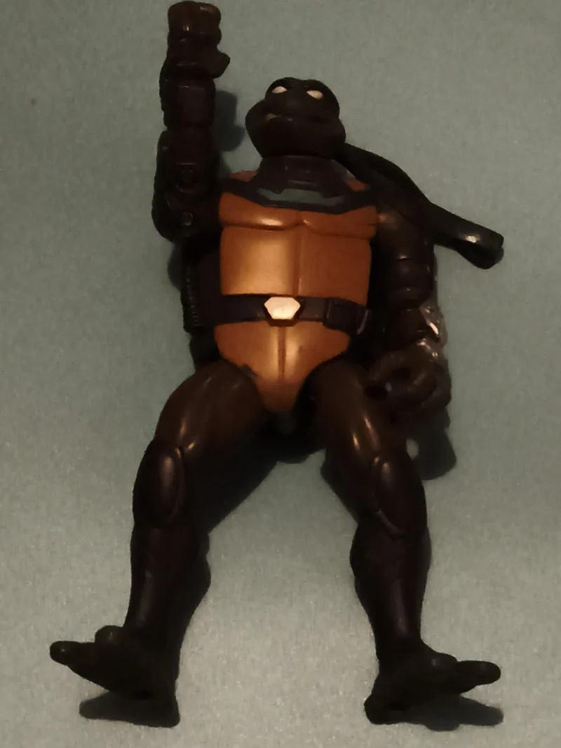 Figurine Tortue Ninja noire plastron marron articulée TMNT mutant