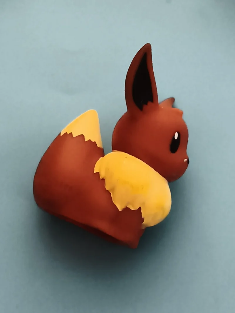 Marionnette doigt Pokémon Evoli figurine souple marron jaune finger puppet