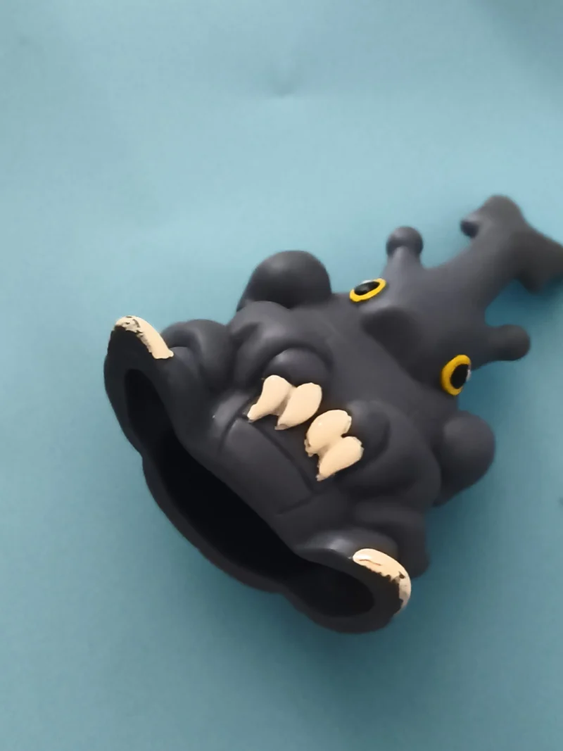 Marionnette doigt Pokémon Héricendre figurine caoutchouc gris yeux jaunes