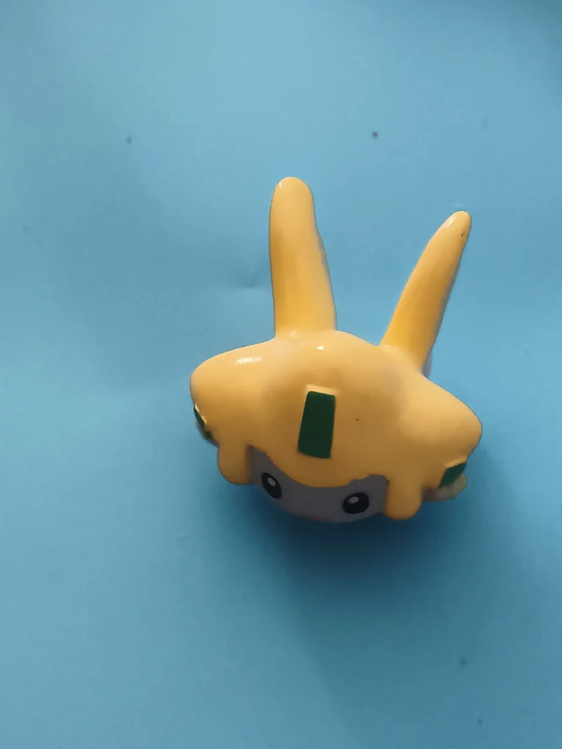 Finger puppet Pokémon Jirachi marionnette doigt figurine jaune
