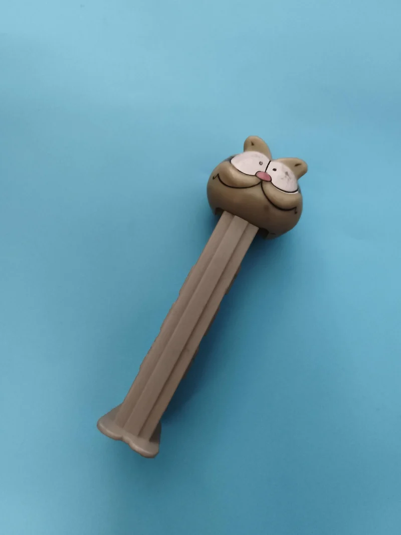 Distributeur Pez chat marron tête ronde figurine bonbon