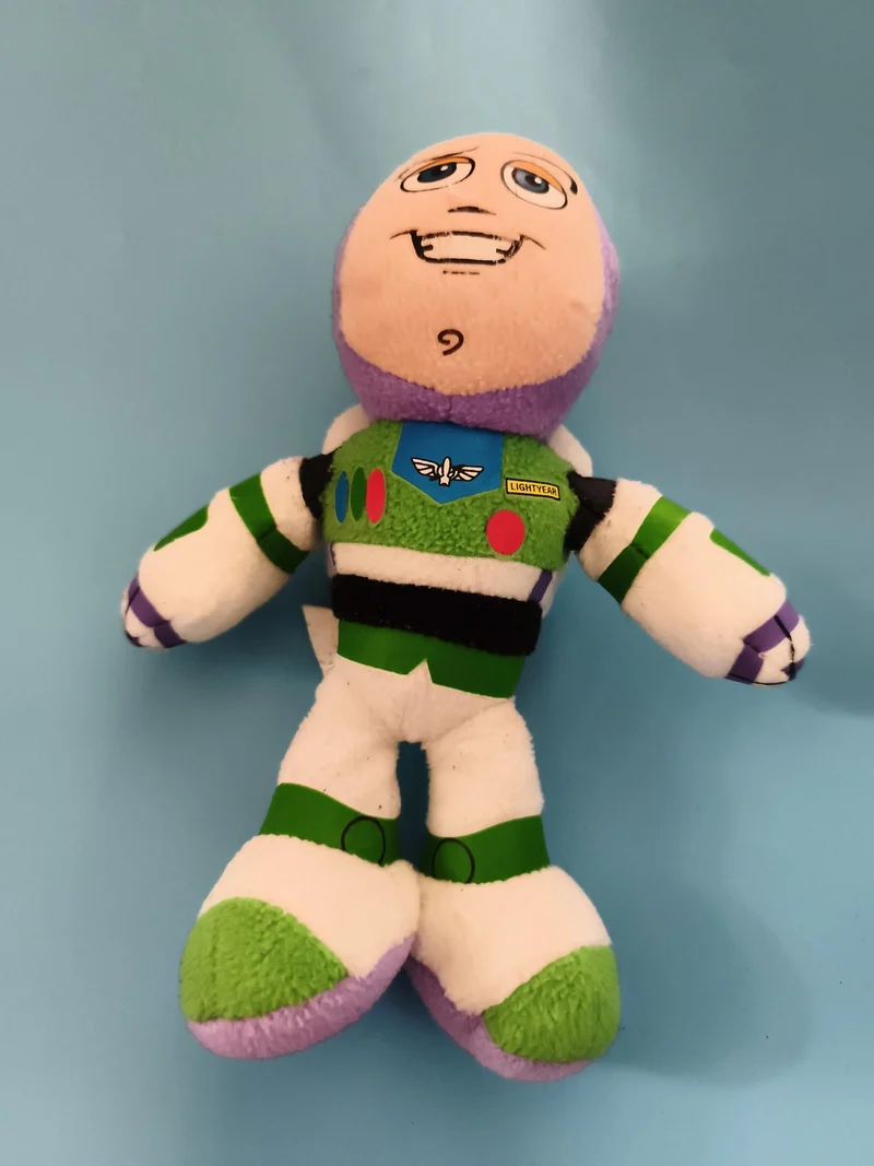 Peluche Buzz l'Éclair Toy Story Disney vert blanc violet doudou enfant
