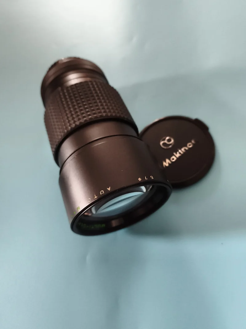 Objectif Makinar Auto M42 noir pour appareil photo reflex capuchon inclus