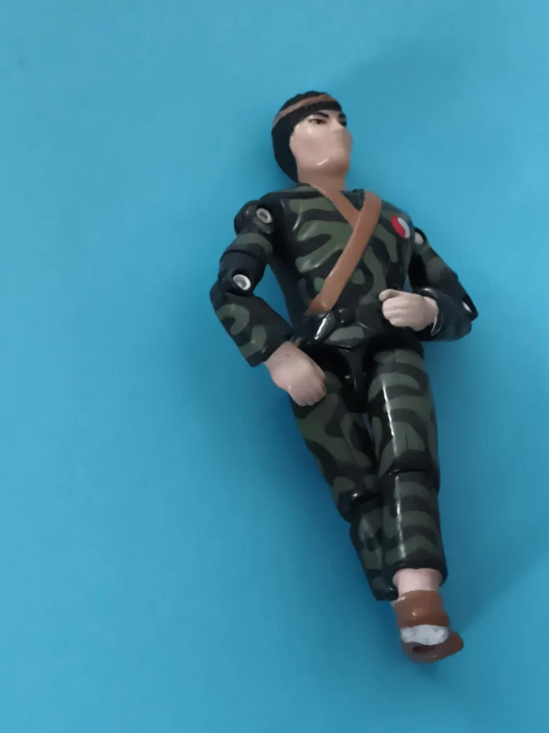 Figurine articulée militaire camouflage Gi Joe tenue verte bandeau