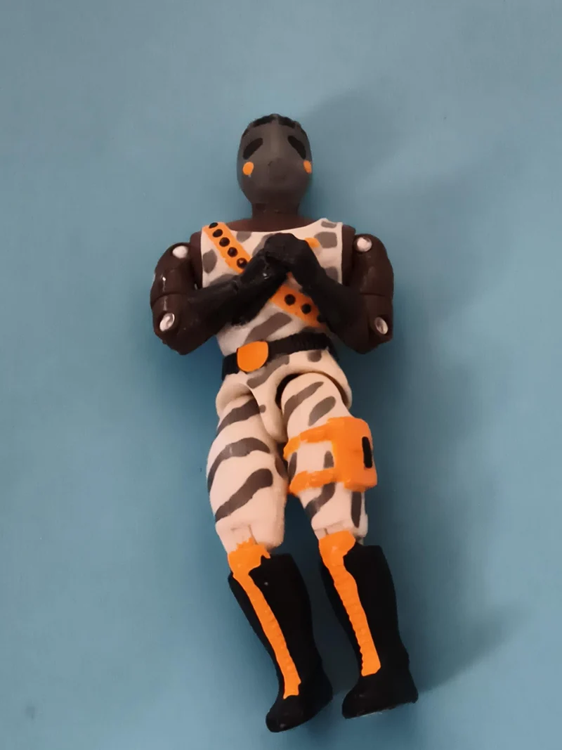 Figurine articulée GI Joe camouflage blanc noir orange