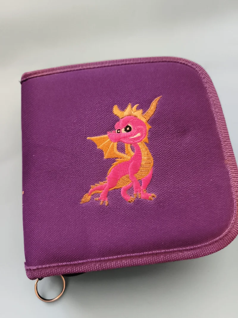 Pochette jeux Playstation violette dragon brodé vide étui CD zip