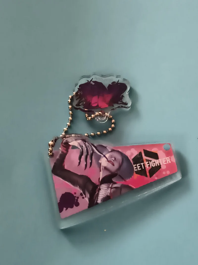 Porte-clés Street Fighter Juri design rose, chaîne bille, illustration jeu vidéo
