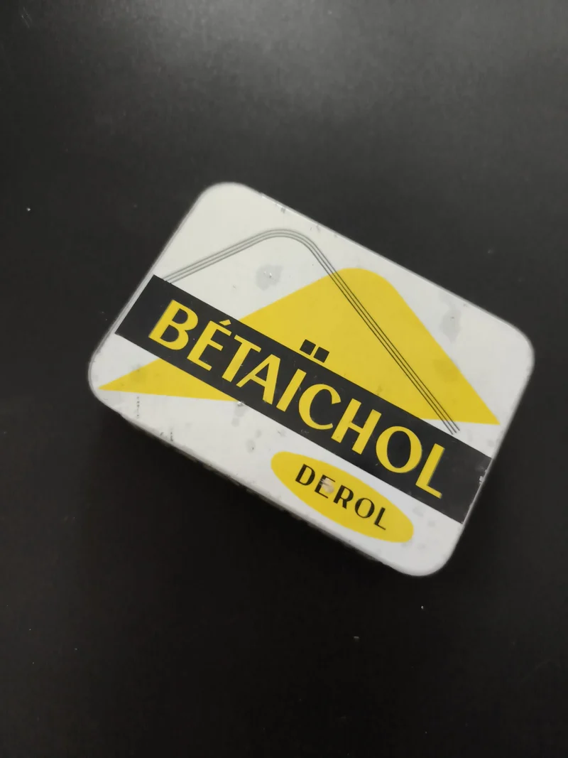 Boîte ancienne Bétaïchol Derol, métal décor jaune noir, vintage pharmacie