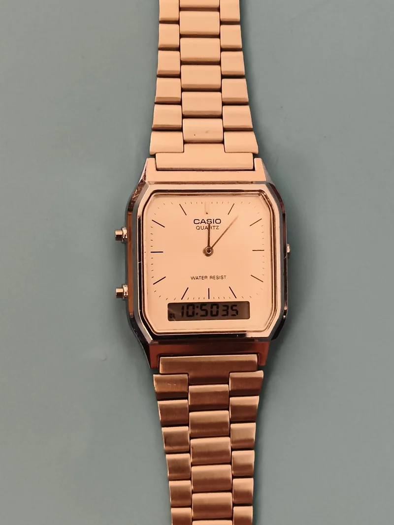 Montre Casio quartz double affichage doré bracelet métal Water Resist