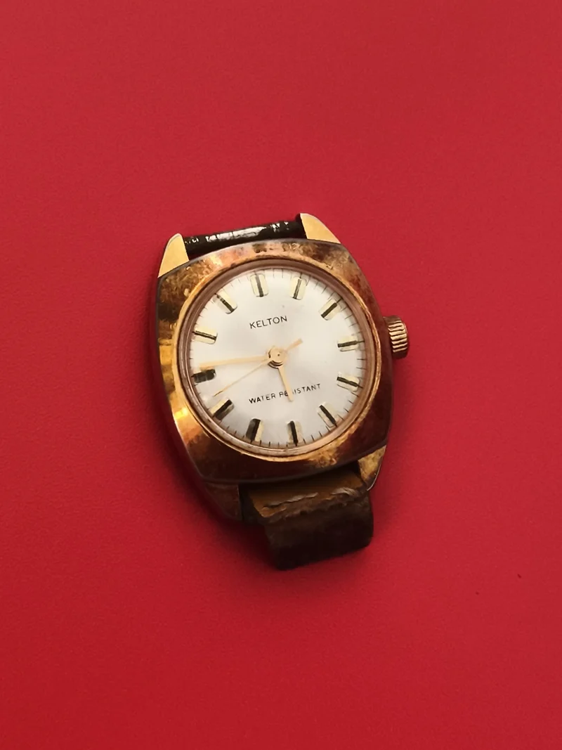Montre vintage Kelton mécanique à réviser boîtier doré cadran blanc ancien