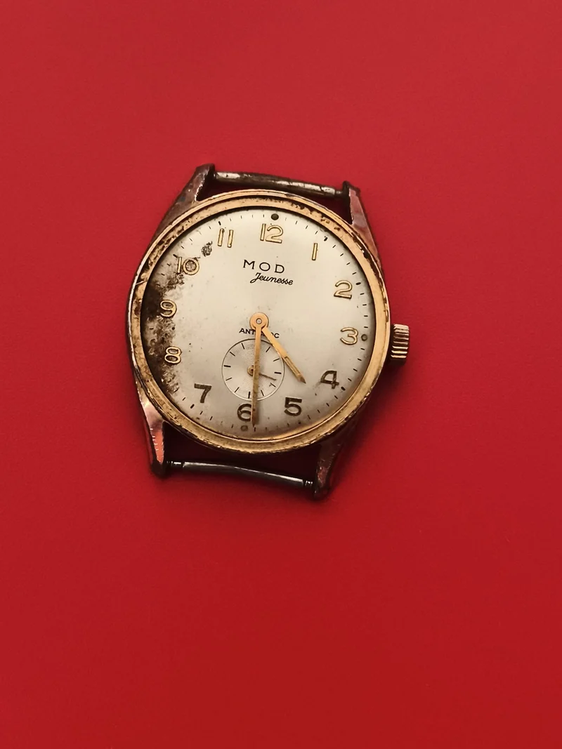 Montre MOD Jeunesse mécanique à réviser cadran blanc doré années 50-60