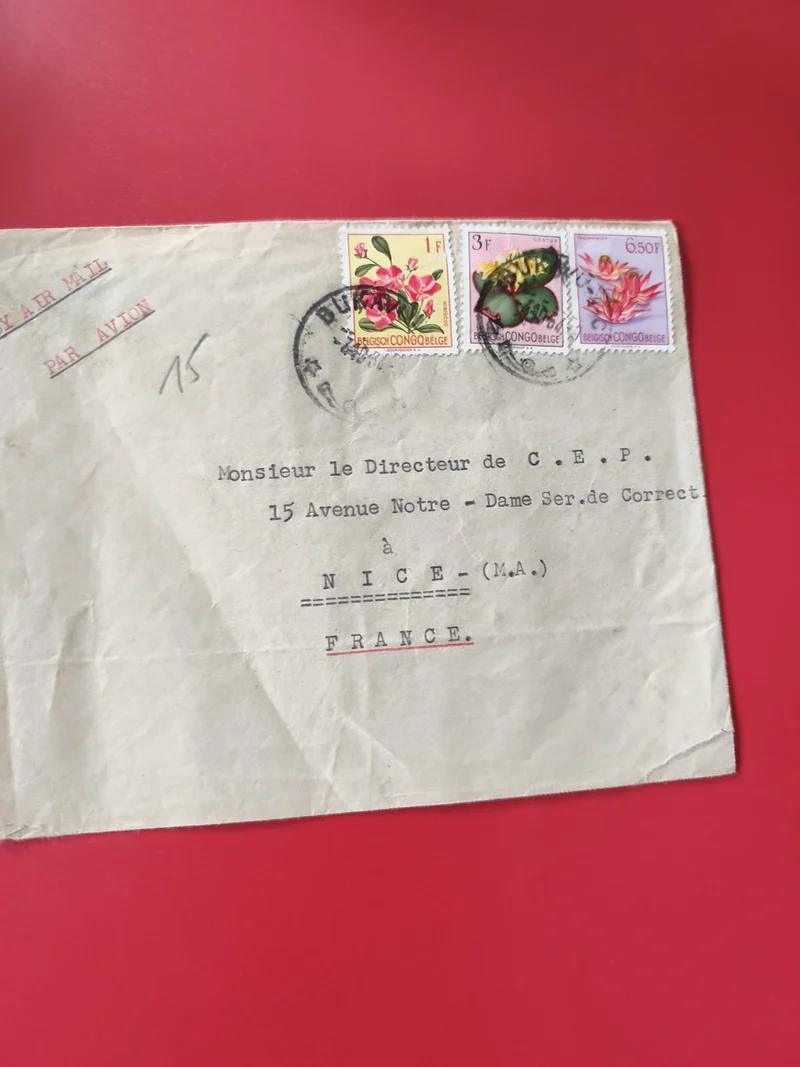 Enveloppe affranchie Congo Belge avec timbres fleurs, cachets visibles