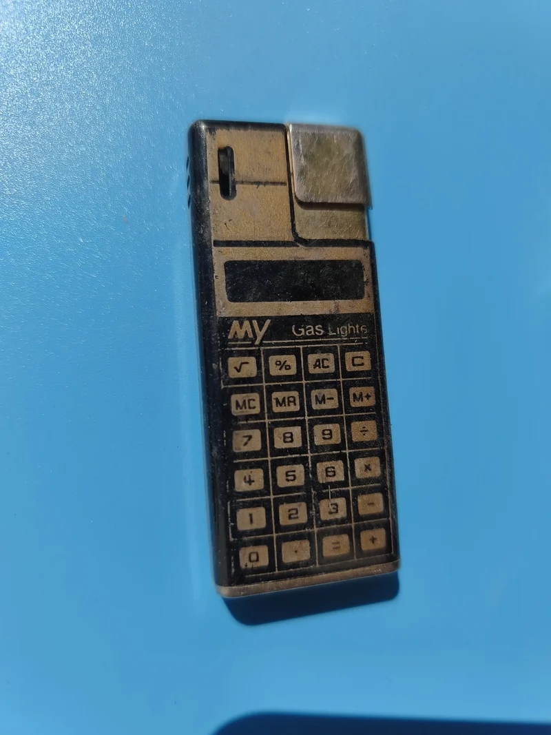 Ancien briquet publicitaire calculatrice vintage, en l?état, collection rétro