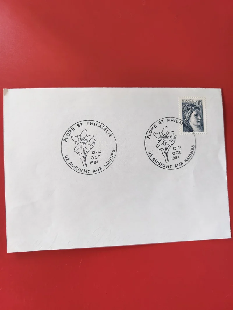 Enveloppe philatélie France 1984 avec timbre Marianne et cachets floraux