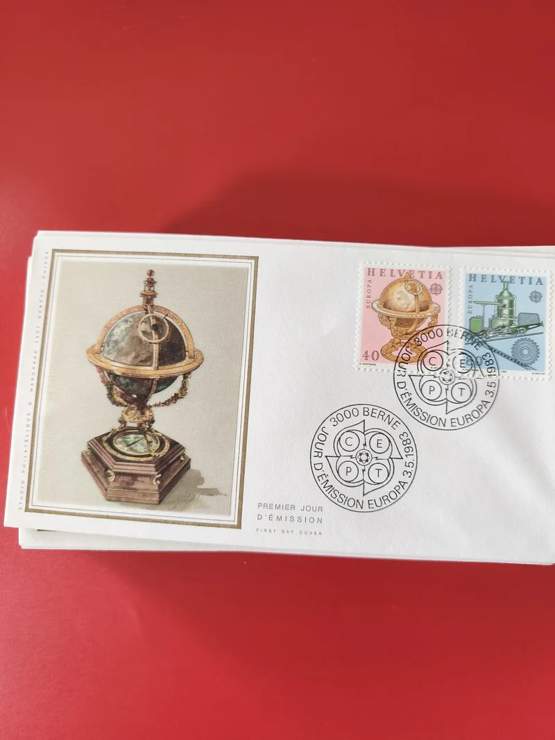 Enveloppe philatélie Helvetia Premier Jour globe terrestre, timbres Suisse 1983