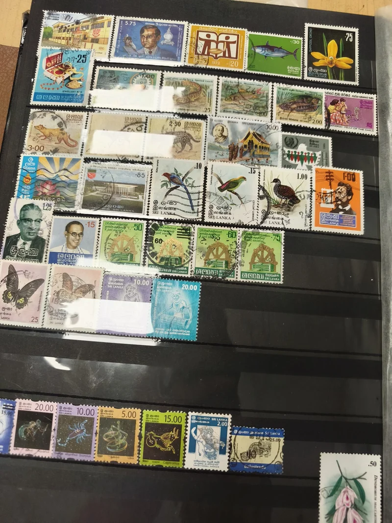 Lot timbres Sri Lanka animaux fleurs personnages multicolores (support non inclu