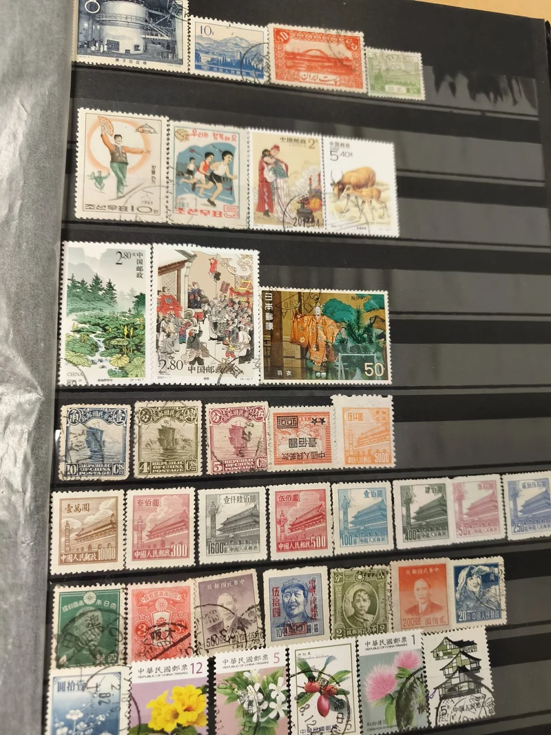 Lot timbres Asie multicolores thématiques paysages personnages animaux fleurs