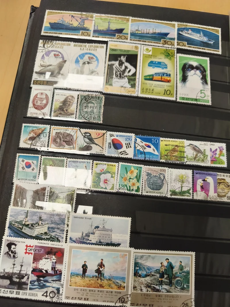 Lot de timbres thématiques divers, paysages, animaux, sports, oblitérés