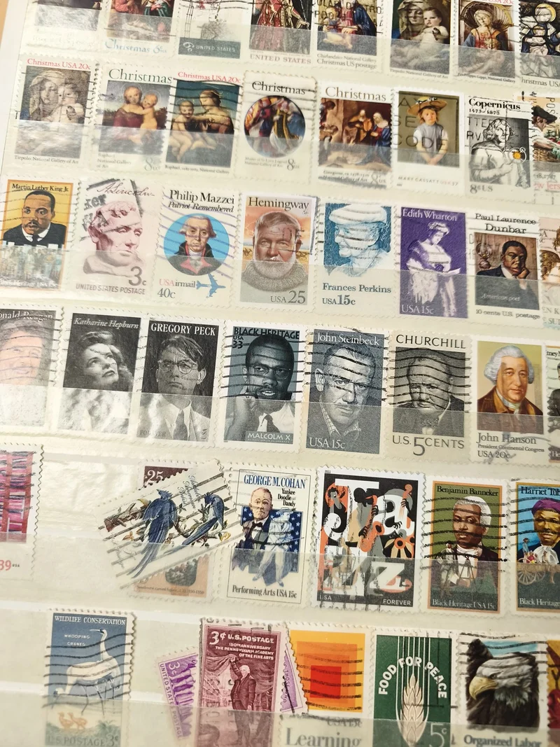 Lot de timbres USA oblitérés portraits, thématiques variées, support non inclus
