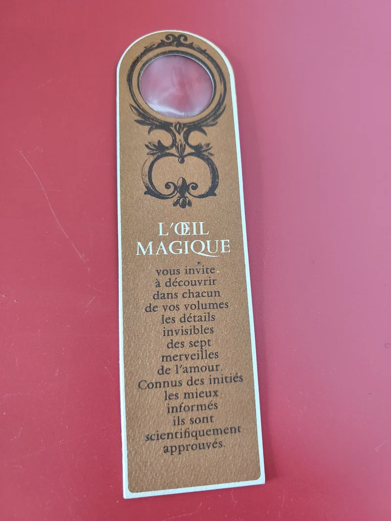 Ancien marque-page publicitaire vintage L??il Magique loupe décor brun rétro