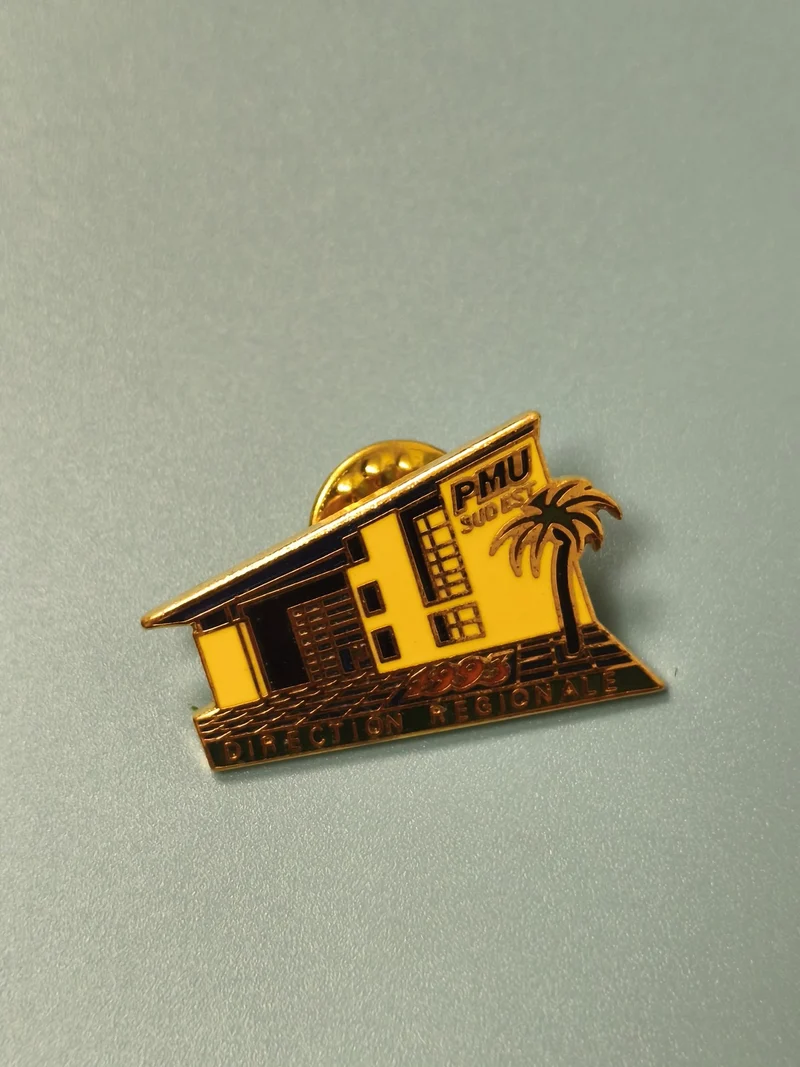 Vintage pin's PMU Direction Régionale 1993 bâtiment palmier jaune collection