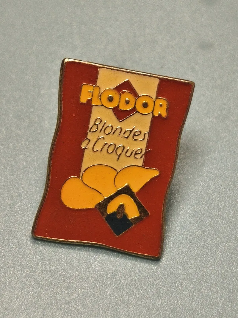 Pin's vintage Flodor Blondes à croquer rouge jaune, collection publicitaire