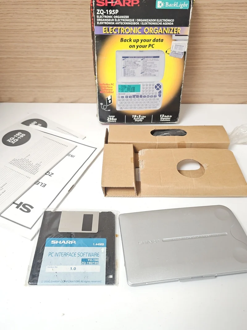 Organiseur électronique Sharp ZQ-195P - Assistant personnel compact d'occasion