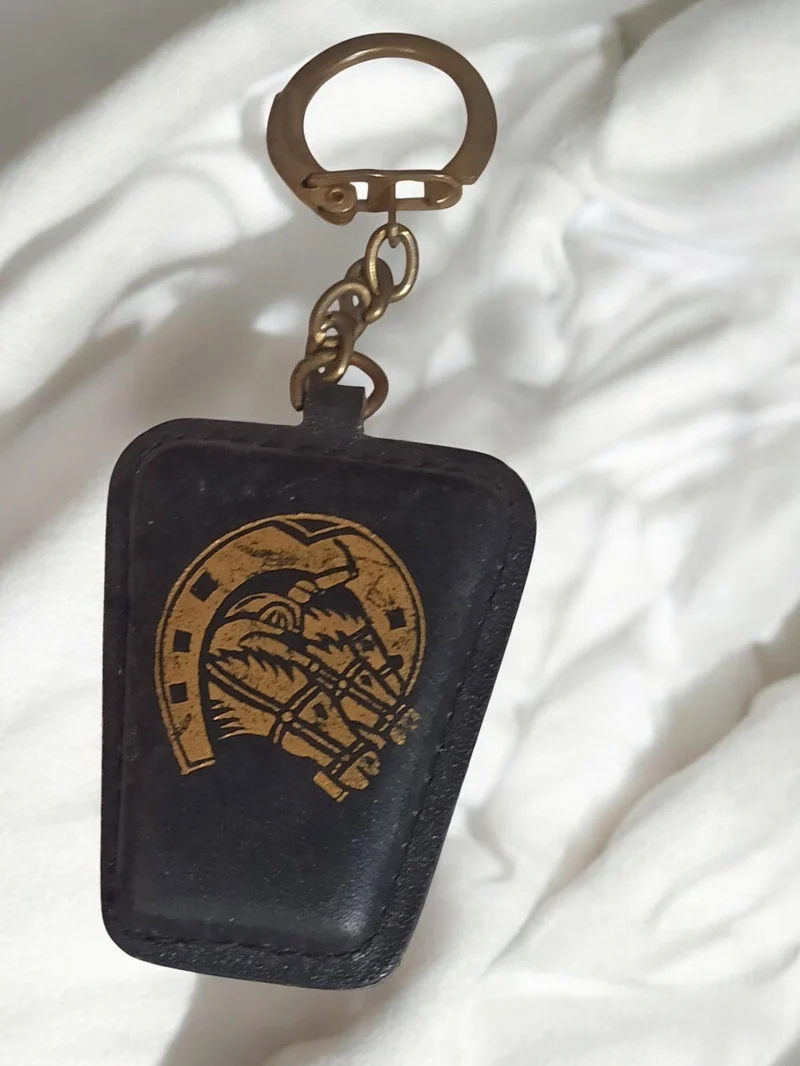 Porte-clés vintage ancien rétro cheval fer à cheval objet publicitaire rare